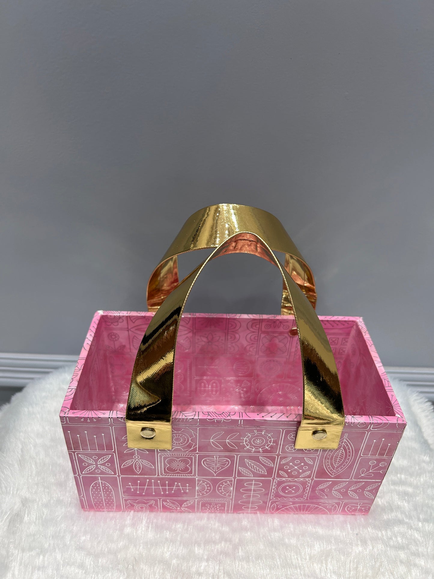 Pink Box With Golden Grip